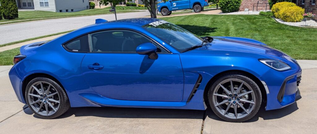 Side view of freshly detailed 2022 World Rally Blue Subaru BRZ