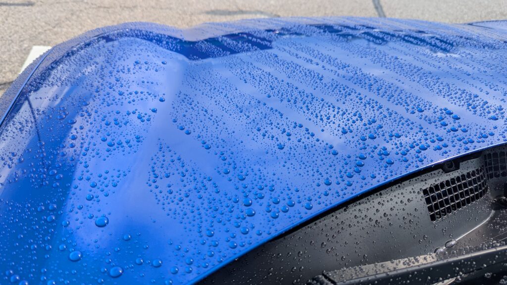 Water beads on hood after applying Armour Detail Supply Armour Quartz Coating